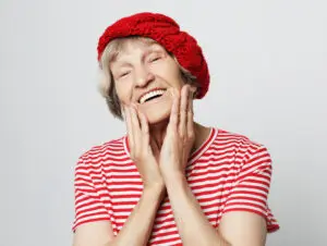 Woman smiling implant dentistry concept