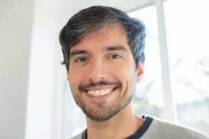 Photo by Kampus Production: https://www.pexels.com/photo/portrait-of-a-handsome-man-6670973/ man smiling with brilliant teeth