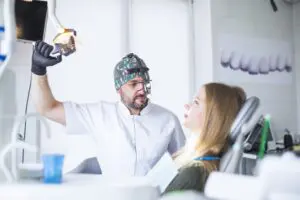 https://pixabay.com/photos/preventive-dentistry-dentistry-8858477/ dentist examining patient